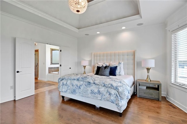 16821 Goddard St, Overland Park, KS 66221 - bedroom featuring crown molding, wood finished floors, baseboards, recessed lighting, and connected bathroom