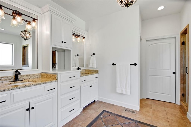 16821 Goddard St, Overland Park, KS 66221 - full bathroom with double vanity, baseboards, a tile shower, tile patterned floors, and recessed lighting