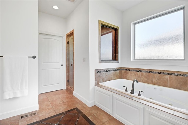 16821 Goddard St, Overland Park, KS 66221 - full bath with a jetted tub, baseboards, a shower stall, inlaid floor details, and recessed lighting