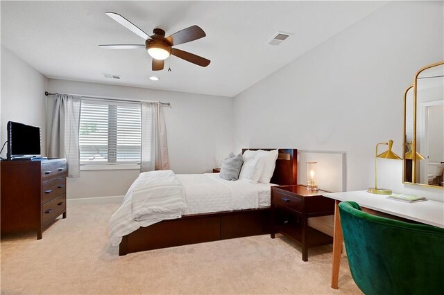 16821 Goddard St, Overland Park, KS 66221 - bedroom with light carpet, a ceiling fan, and baseboards