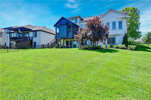 16821 Goddard St, Overland Park, KS 66221 - view of front of house with stairway, a sunroom, and stucco siding