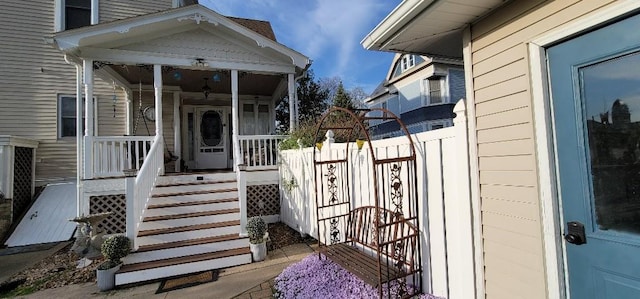 308 E Arrow St, Marshall, MO 65340 - doorway to property featuring covered porch