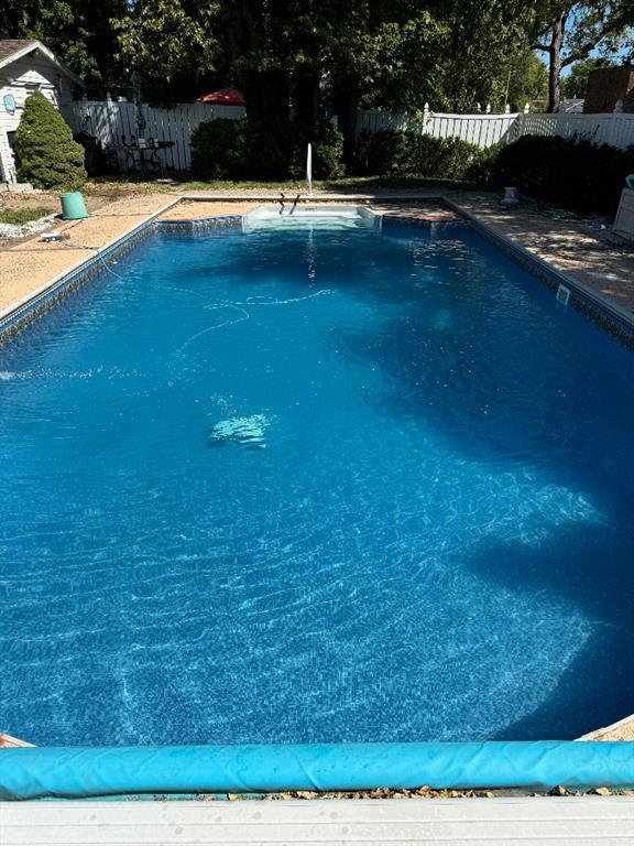308 E Arrow St, Marshall, MO 65340 - view of swimming pool featuring a fenced backyard