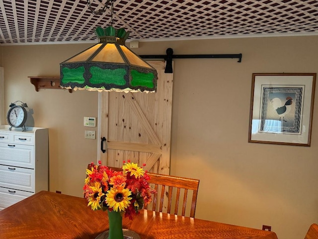 308 E Arrow St, Marshall, MO 65340 - dining room with a barn door