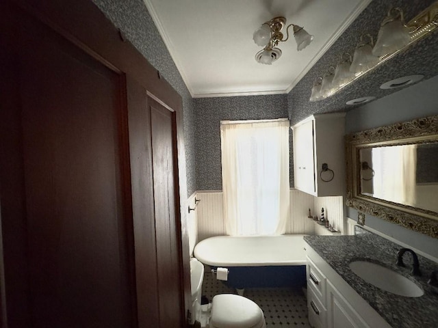 308 E Arrow St, Marshall, MO 65340 - bathroom featuring crown molding, wainscoting, wallpapered walls, a freestanding bath, and vanity