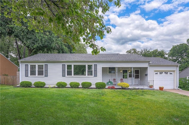 7200 W 72nd Ter, Overland Park, KS 66204 - ranch-style home with covered porch, a garage, and driveway