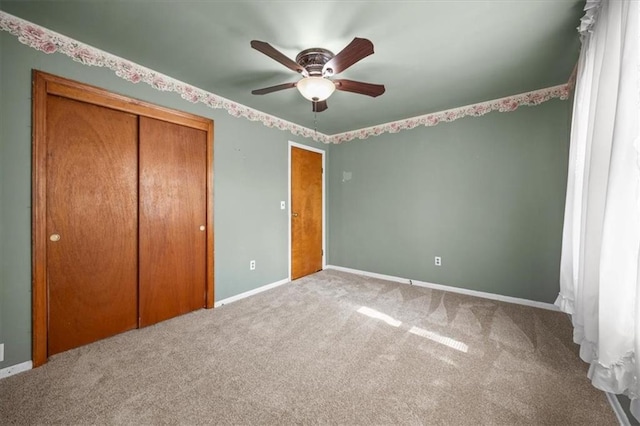 6608 N Edison Ave, Kansas City, MO 64151 - unfurnished bedroom featuring carpet, a closet, baseboards, and ceiling fan