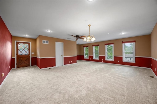 6608 N Edison Ave, Kansas City, MO 64151 - carpeted empty room featuring baseboards, ceiling fan, a chandelier, and recessed lighting