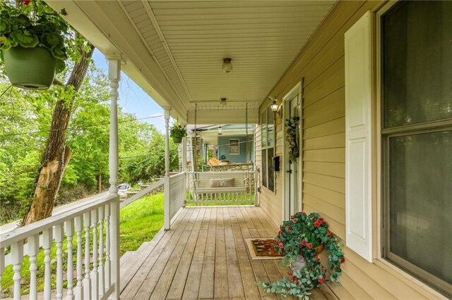 124 Wildwood St, Excelsior Springs, MO 64024 - view of wooden porch