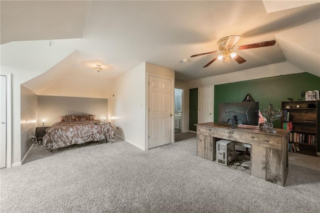 124 Wildwood St, Excelsior Springs, MO 64024 - bedroom featuring carpet, vaulted ceiling, baseboards, ceiling fan, and a desk