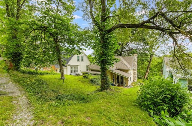 124 Wildwood St, Excelsior Springs, MO 64024 - view of grassy yard
