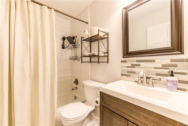 3606 Gillham Rd Unit 25, Kansas City, MO 64111 - bathroom featuring toilet, backsplash, vanity, and shower / bath combo