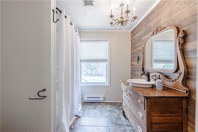 2200 E 126th St, Kansas City, MO 64146 - full bath with a baseboard radiator, vanity, a chandelier, ornamental molding, and wooden walls