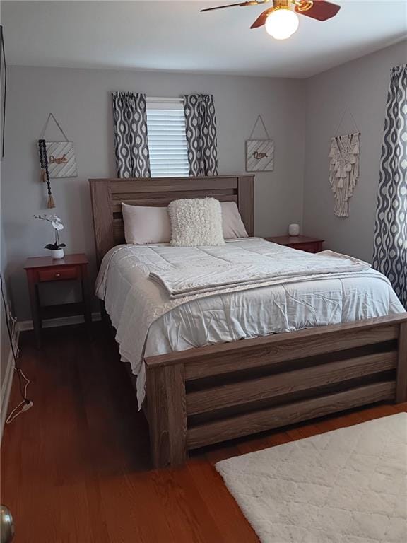 2200 E 126th St, Kansas City, MO 64146 - bedroom with wood finished floors and a ceiling fan
