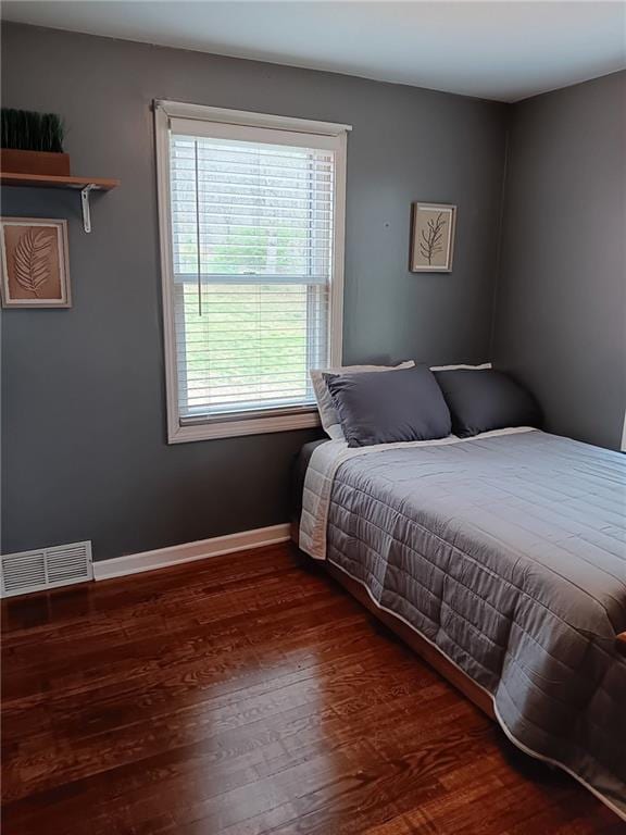 2200 E 126th St, Kansas City, MO 64146 - bedroom featuring wood finished floors