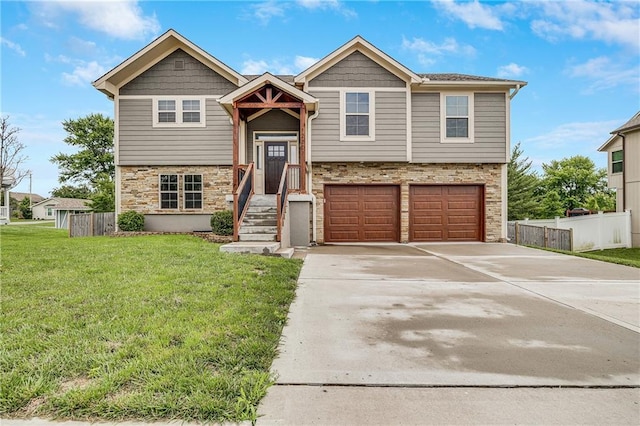 12301 White Oak St, Peculiar, MO 64078 - bi-level home featuring stone siding, an attached garage, and concrete driveway