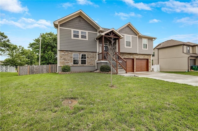 12301 White Oak St, Peculiar, MO 64078 - raised ranch with concrete driveway, stone siding, and an attached garage