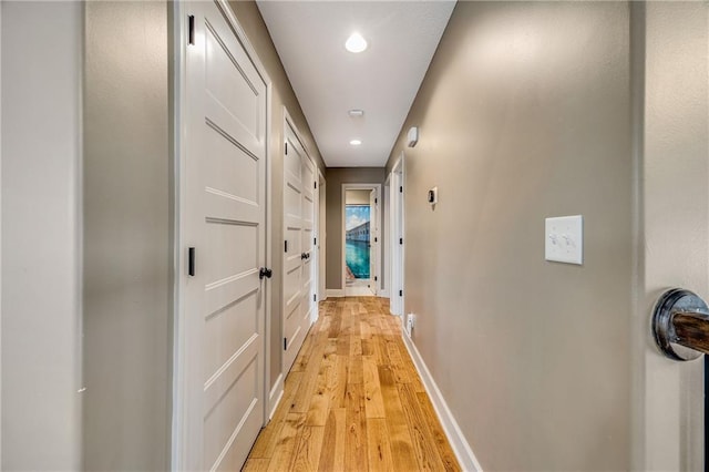 12301 White Oak St, Peculiar, MO 64078 - hall with light wood finished floors, recessed lighting, and baseboards