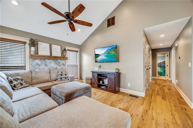 12301 White Oak St, Peculiar, MO 64078 - living area with light wood-style floors, ceiling fan, baseboards, recessed lighting, and high vaulted ceiling