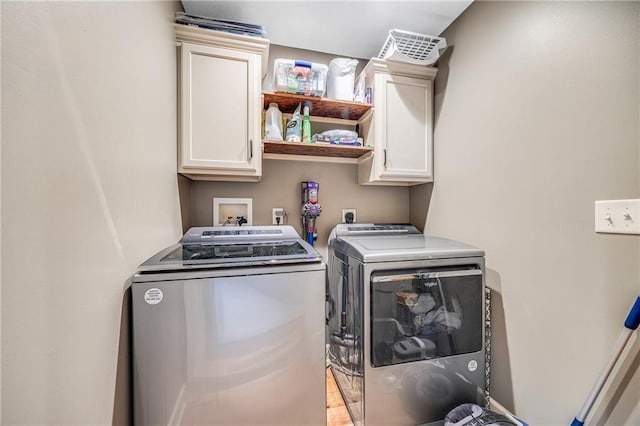 12301 White Oak St, Peculiar, MO 64078 - laundry room featuring independent washer and dryer and cabinet space