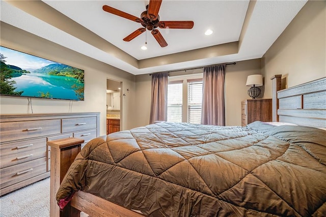 12301 White Oak St, Peculiar, MO 64078 - bedroom featuring a raised ceiling, carpet, connected bathroom, recessed lighting, and ceiling fan