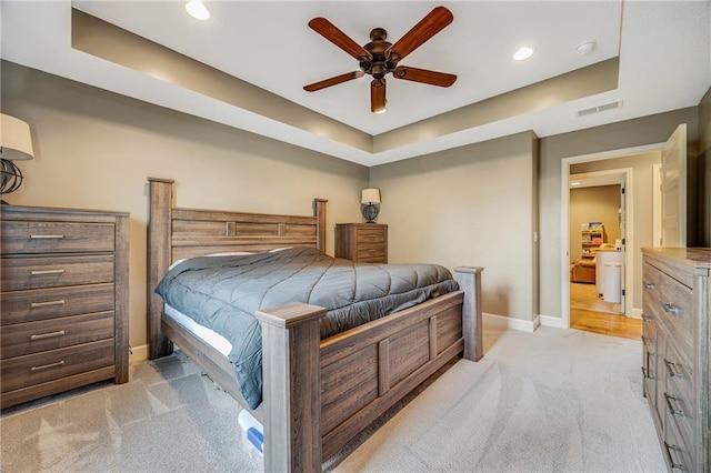 12301 White Oak St, Peculiar, MO 64078 - bedroom with light carpet, a raised ceiling, baseboards, recessed lighting, and ceiling fan