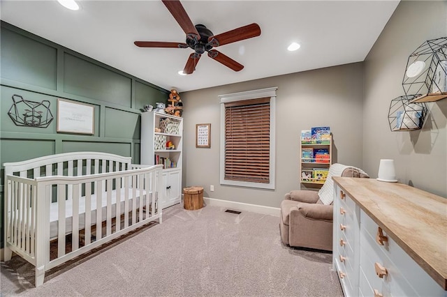 12301 White Oak St, Peculiar, MO 64078 - carpeted bedroom featuring recessed lighting, baseboards, a nursery area, and a ceiling fan