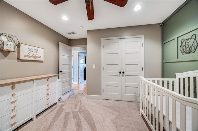 12301 White Oak St, Peculiar, MO 64078 - bedroom with light carpet, a closet, recessed lighting, ceiling fan, and baseboards