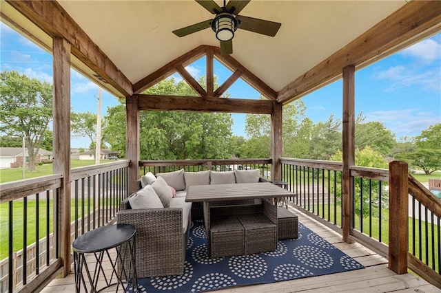 12301 White Oak St, Peculiar, MO 64078 - wooden deck with an outdoor living space, a ceiling fan, and view of scattered trees