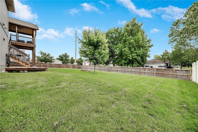 12301 White Oak St, Peculiar, MO 64078 - view of yard featuring stairs and a ceiling fan