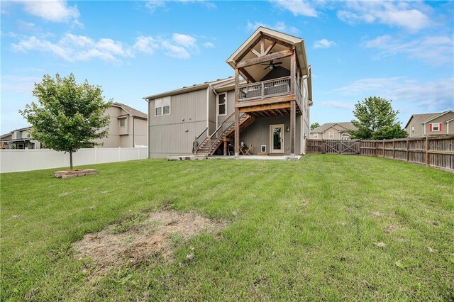 12301 White Oak St, Peculiar, MO 64078 - rear view of house featuring stairs, a ceiling fan, and a deck