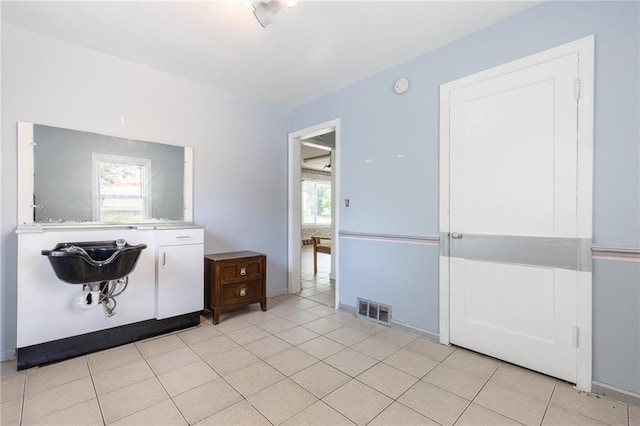 7001 Hunter St, Raytown, MO 64133 - bathroom featuring tile patterned flooring