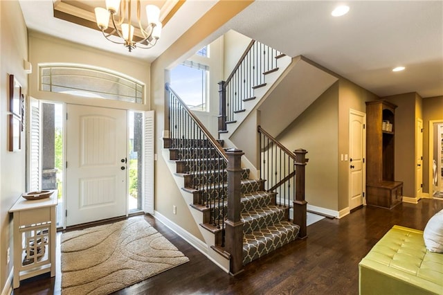 11446 S Longview Rd, Olathe, KS 66061 - entrance foyer featuring a chandelier, stairs, wood finished floors, healthy amount of natural light, and recessed lighting