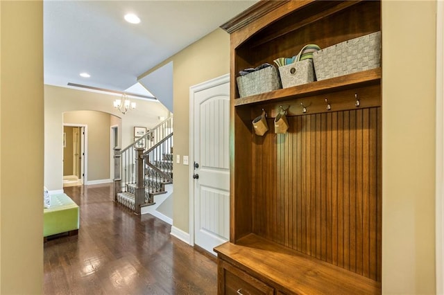 11446 S Longview Rd, Olathe, KS 66061 - mudroom featuring arched walkways, a chandelier, wood finished floors, and recessed lighting