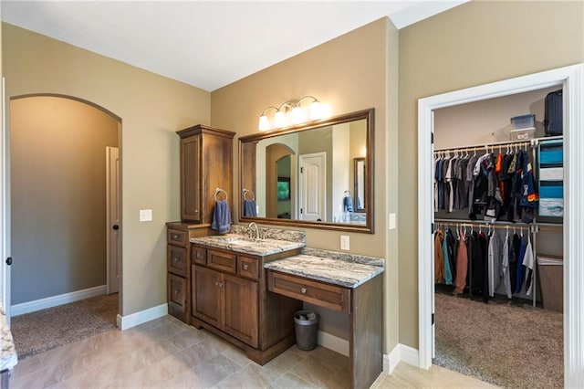 11446 S Longview Rd, Olathe, KS 66061 - full bath with vanity and a walk in closet