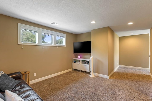 11446 S Longview Rd, Olathe, KS 66061 - carpeted living area featuring a textured ceiling and recessed lighting