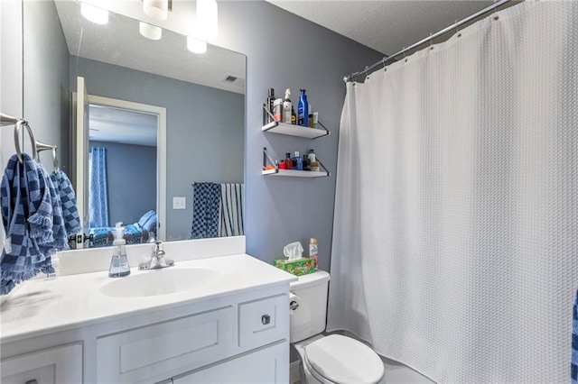 11446 S Longview Rd, Olathe, KS 66061 - bathroom featuring vanity and a shower with shower curtain
