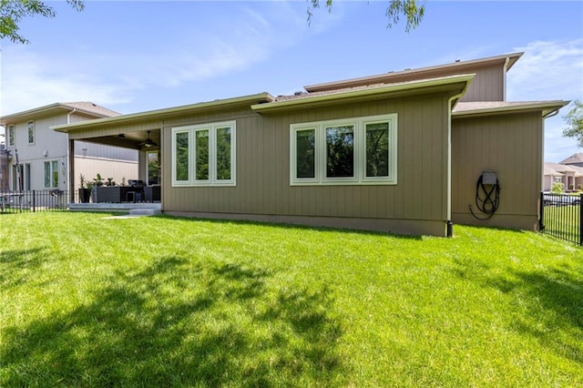 11446 S Longview Rd, Olathe, KS 66061 - rear view of house with a ceiling fan