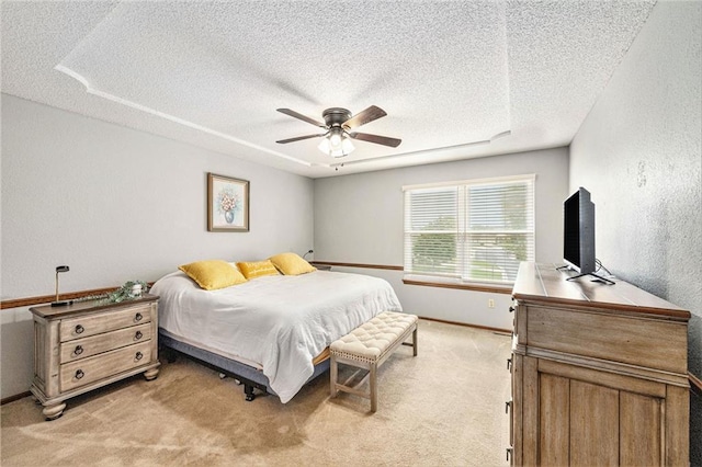 16519 E 53rd Street Ct, Independence, MO 64055 - bedroom with a textured ceiling, light carpet, a ceiling fan, and baseboards