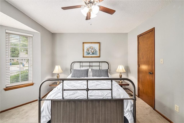 16519 E 53rd Street Ct, Independence, MO 64055 - bedroom with carpet floors, baseboards, a textured ceiling, and ceiling fan