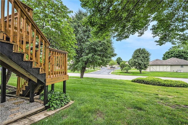 16519 E 53rd Street Ct, Independence, MO 64055 - view of grassy yard with stairway and a wooden deck