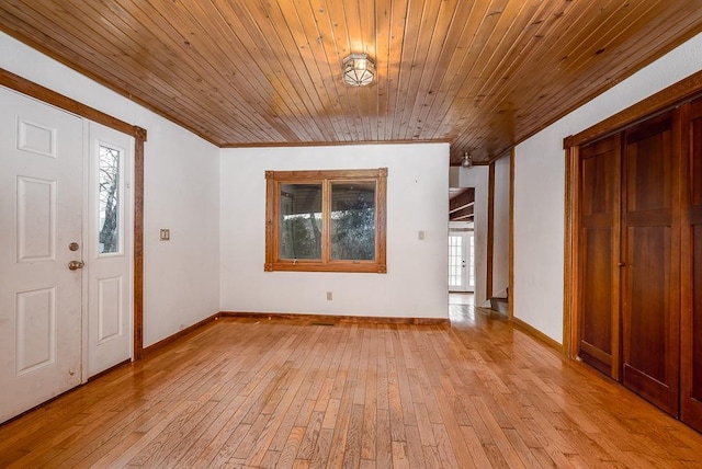 22450 Hatchell Rd, Tonganoxie, KS 66086 - entryway featuring wood ceiling, light wood finished floors, and baseboards