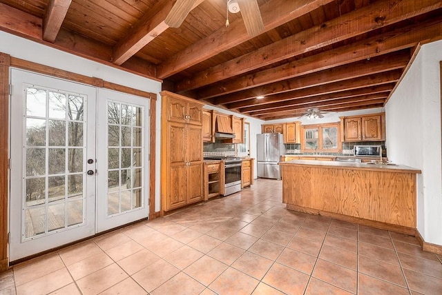 22450 Hatchell Rd, Tonganoxie, KS 66086 - kitchen featuring stainless steel appliances, wooden ceiling with exposed beams, backsplash, and light tile patterned floors