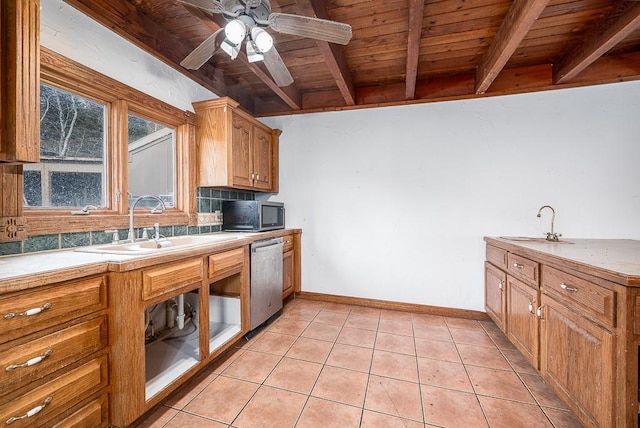 22450 Hatchell Rd, Tonganoxie, KS 66086 - kitchen featuring dishwasher, wood ceiling with exposed beams, a sink, light tile patterned floors, and baseboards