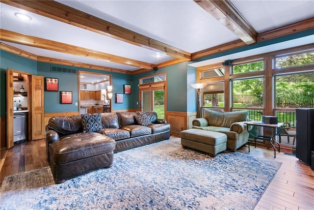 13008 Fontana St, Leawood, KS 66209 - living room featuring beamed ceiling, wainscoting, wood-type flooring, and ornamental molding
