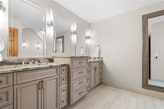 13008 Fontana St, Leawood, KS 66209 - full bathroom featuring double vanity and baseboards
