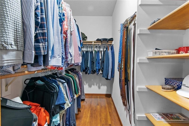 13008 Fontana St, Leawood, KS 66209 - spacious closet with wood finished floors