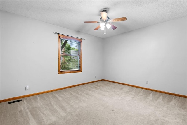 13008 Fontana St, Leawood, KS 66209 - unfurnished room with carpet flooring, ceiling fan, baseboards, and a textured ceiling