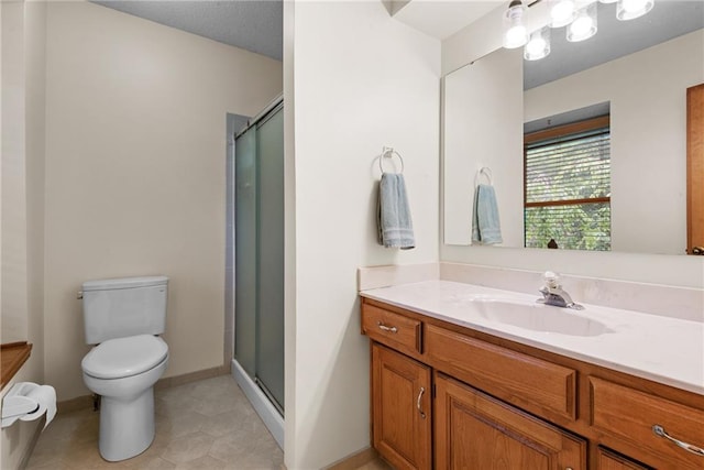 13008 Fontana St, Leawood, KS 66209 - full bathroom featuring toilet, vanity, a stall shower, tile patterned floors, and baseboards