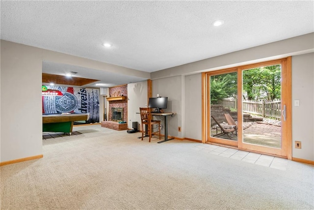 13008 Fontana St, Leawood, KS 66209 - playroom featuring carpet flooring, baseboards, a textured ceiling, a fireplace, and recessed lighting